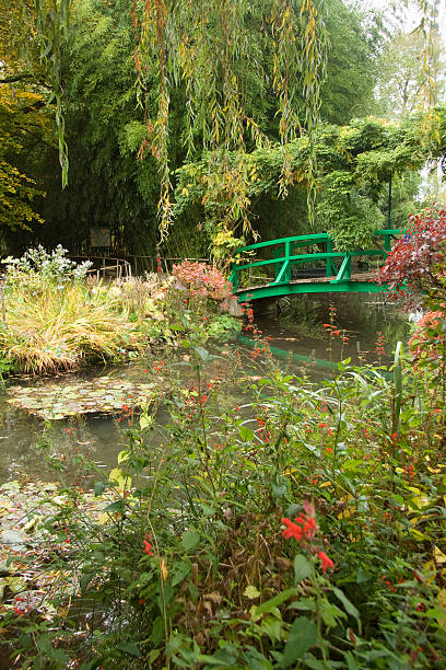 Bridge in Monet's Garden, Giverny Home of artist Claude Monet showing the famous water lillies and Japanese bridge. giverny stock pictures, royalty-free photos & images