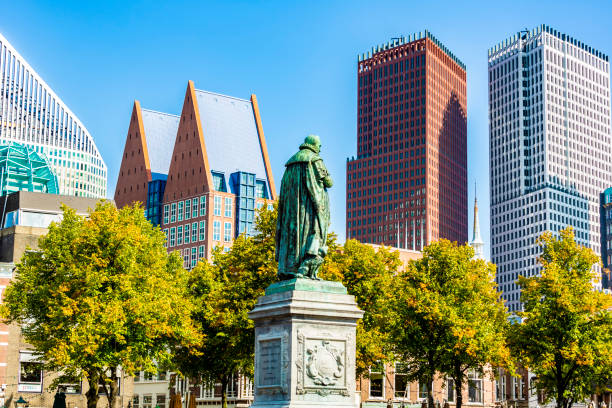 istock Business district Den Haag with statue 1467314296