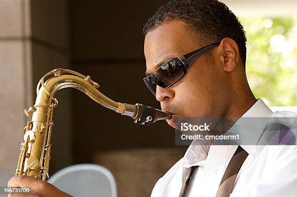 Musician With Sunglasses On Playing Saxophone Stock Photo - Download Image Now - Adult, African Ethnicity, African-American Ethnicity