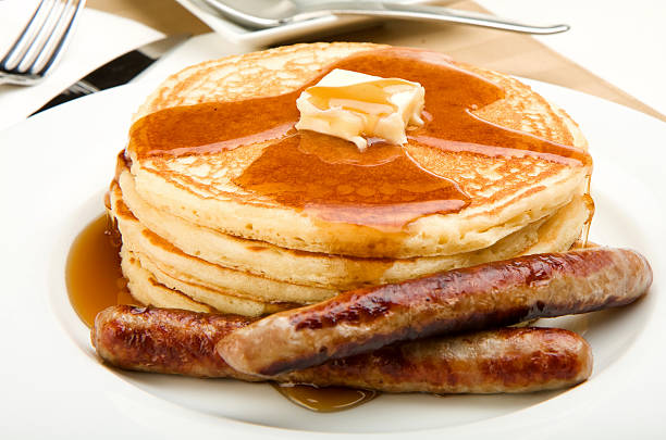 Pancake Breakfast Breakfast of coffee, pancakes and sausage pancake stock pictures, royalty-free photos & images