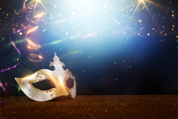 istock Image of elegant venetian mask over glitter background 1467318347