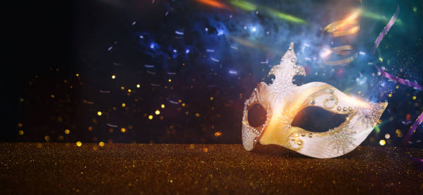 istock Image of elegant venetian mask over glitter background 1467318356