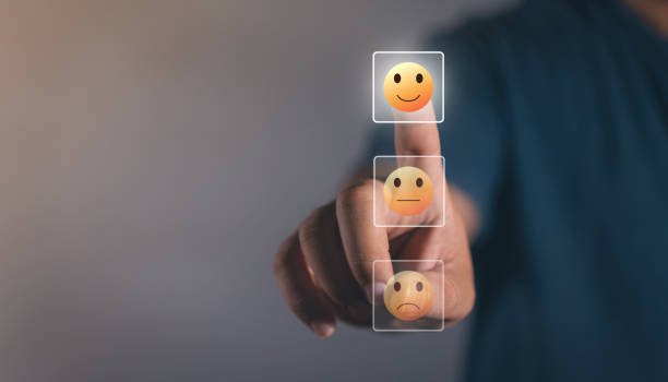 istock Feedback rating concept, Man choosing smiley face icon. feedback rating and positive customer review experience, business man select happy on satisfaction evaluation. Customer service and Satisfaction 1467319094