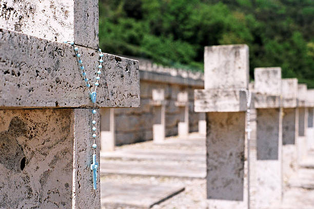 catholic cementery - blue rosary stock photo