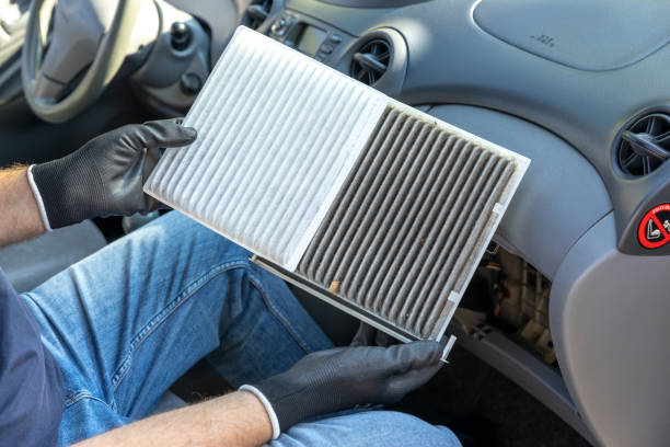 istock Replacing cabin pollen air filter for a car 1467323567