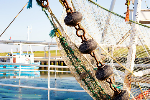 a fisherman's net on the dock of the Centuri fishing port