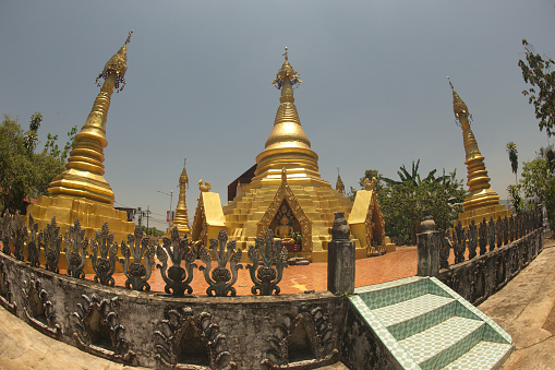 Golden Pagoda at Wat Somdet, a historic site in Amphoe Sangkhlaburi, Kanchanaburi Province , Middle of Thailand. A combination of Thai-Raman and Myanmar art.