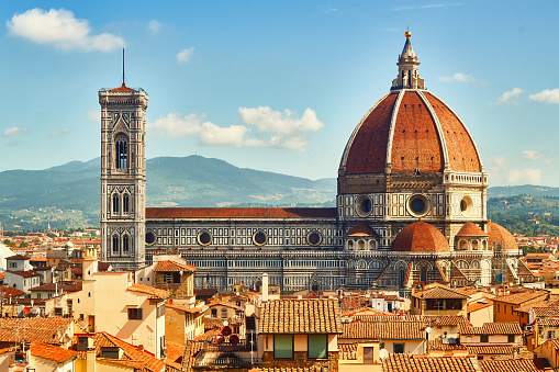 A suggestive panoramic view of the hill of the Cathedral of Saint Lawrence and the medieval district of San Pellegrino, the historic heart of the city of Viterbo, in central Italy. The town of Viterbo stands on the route of the ancient Via Francigena which in medieval times connected the regions of France to Rome up to the commercial ports of Puglia to reach the Holy Land. Image in High Definition format.