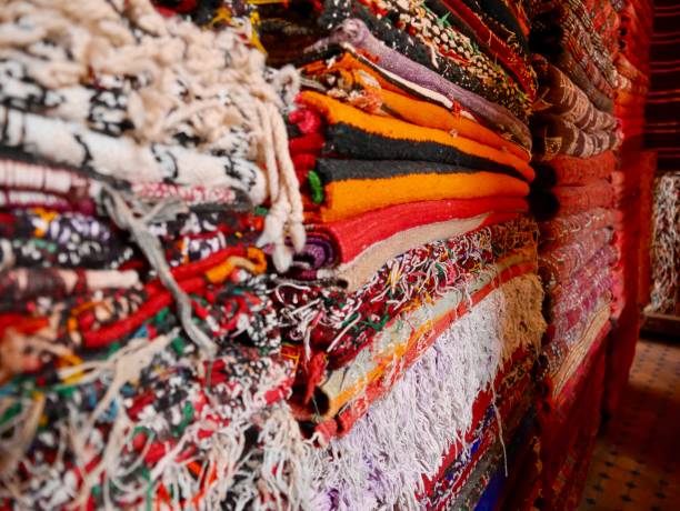 istock Pile of colorful Berber Carpets in Marrakech, Morocco. 1467326085