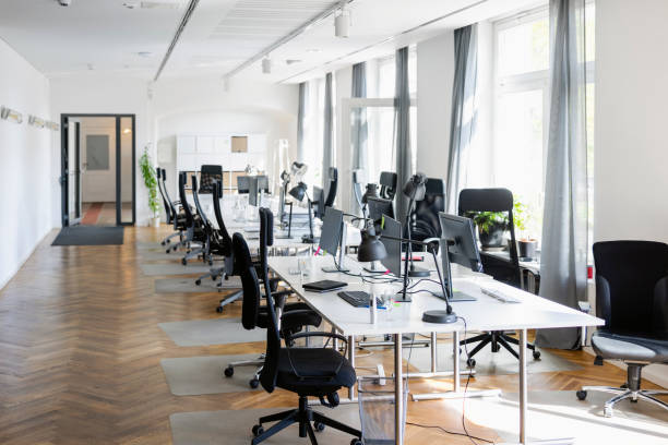 istock Interior of open plan office with no people 1467330215