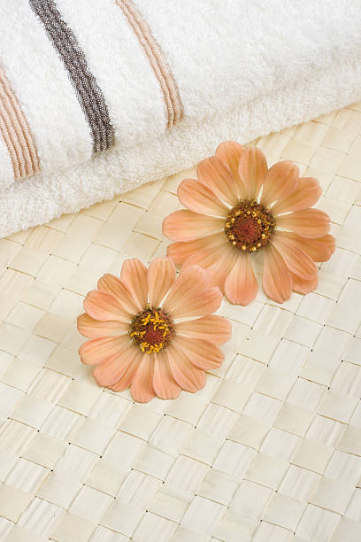istock Spa detail. Towel and flowers. 146733335
