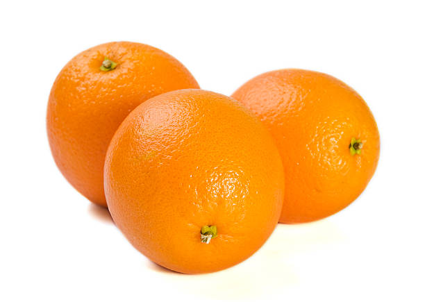 Three fresh oranges stock photo