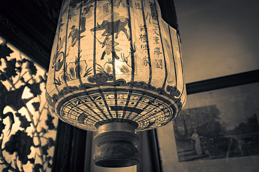 Traditional chinese patterned lamp in the old house interior Melaka Malaysia