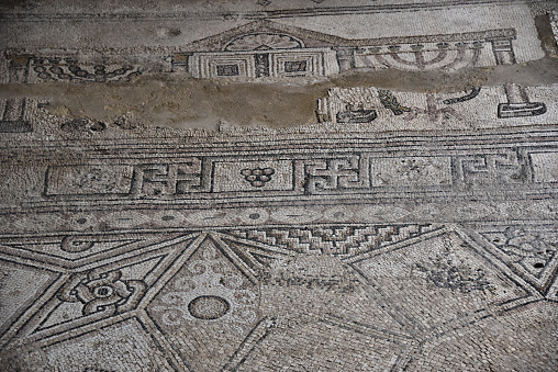 A closeup of an ancient Roman mosaic background in Merida, Spain