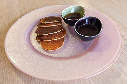 Pancakes with chocolate and maple syrup