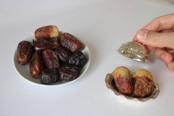 Medina date varieties in a copper pot. ramadan themed photo