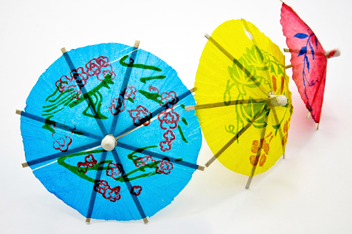 paper umbrellas on white