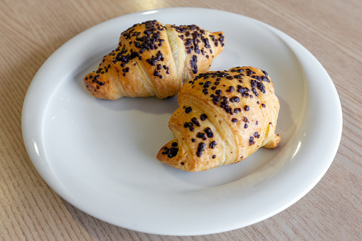 Two croissants on the table