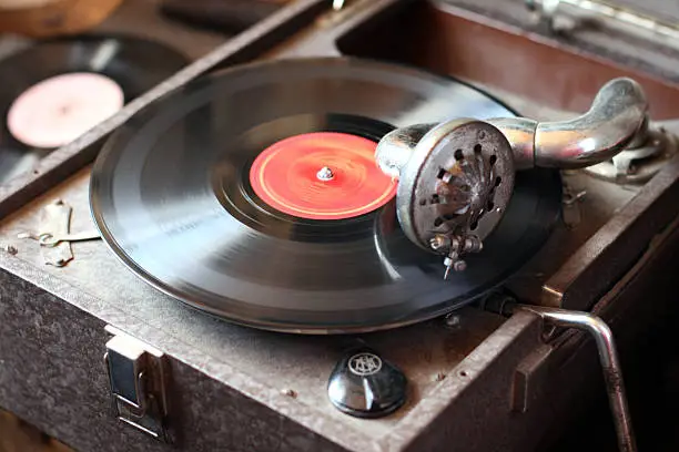 Old vintage gramophone playing vinyl record