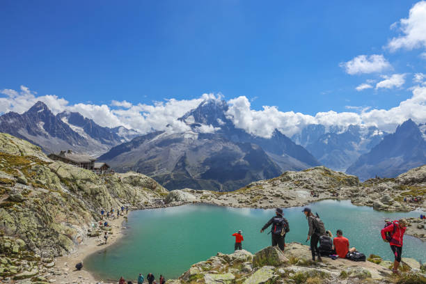 The scenic view of Lac Blanc. Lac Blancs in Chamonix France, One of the most popular destinations for hikers in Chamonix. Chamonix, France- August 25, 2022: The scenic view of Lac Blanc. Lac Blancs in Chamonix France, One of the most popular destinations for hikers in Chamonix. mont blanc massif stock pictures, royalty-free photos & images