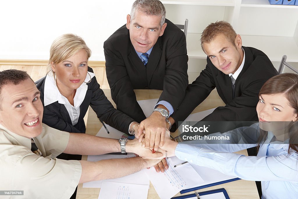 Business group hands put toghether Business group at the meeting, hands put toghether Adult Stock Photo