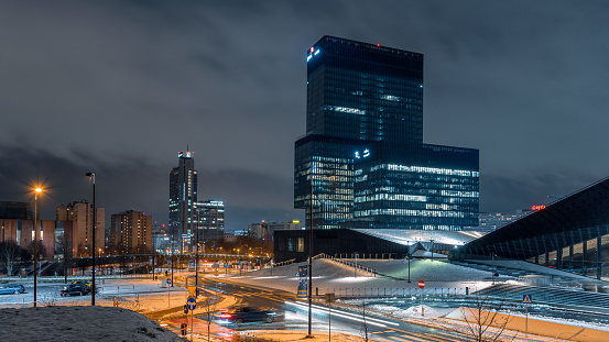 Katowice, Poland - February 03, 2023: Winter, evening panorama of the city of Katowice. Illuminated buildings of a developing and modern city. International Congress Center in Katowice.