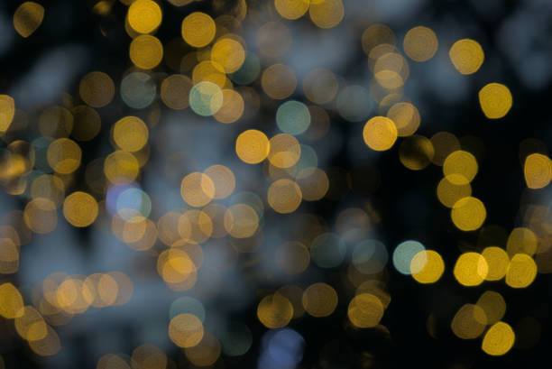 istock bright bubbles of yellow lights, abstract background 1467350589