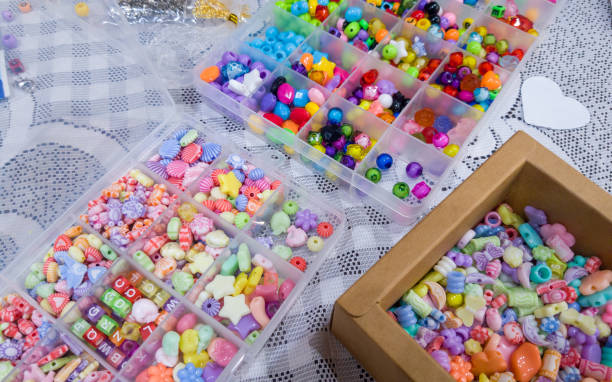 istock Colorful beads with various shapes and designs on the box 1467351757