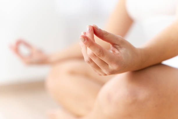 istock Closeup of hand in meditation pose 1467352594