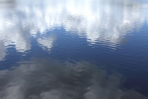 Reflection of cloud in water