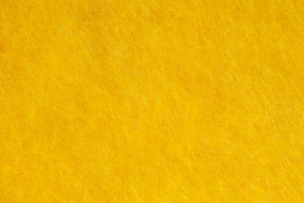 istock Fabric is fleece yellow, background wallpaper, uniform texture pattern 1467359911