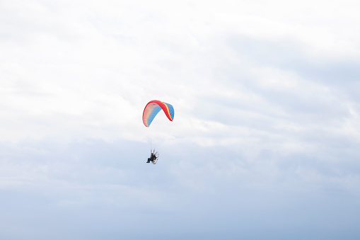Parachute flying by the sea