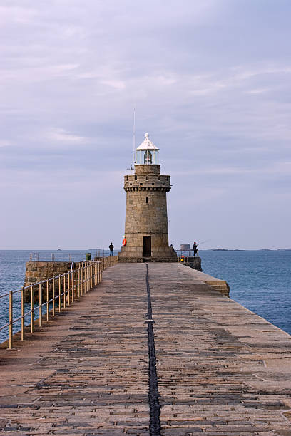 istock Fishing on St Peter Port Breakwater 146736721
