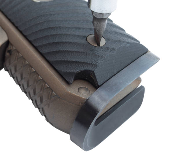 istock Bolt being removed from a handgun grip 1467367656