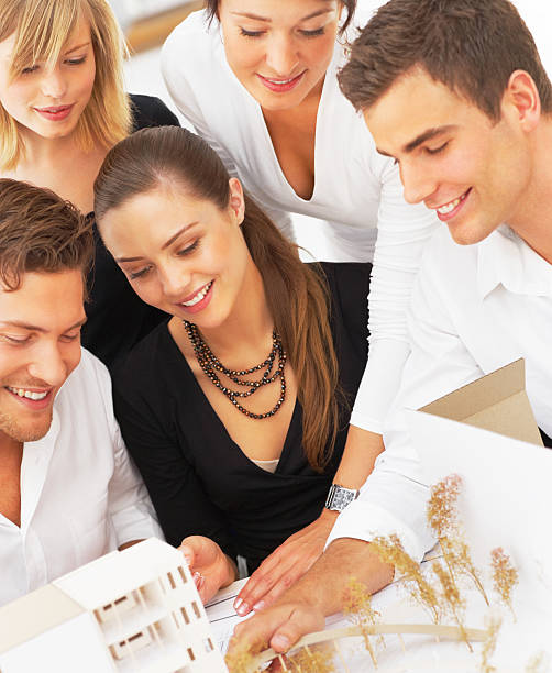 istock Group of architects planning together 146736892