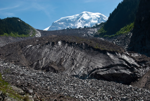 Mt. Rainier towers over the Carbon Glacier, the lowest elevation glacier in the lower 48 states.