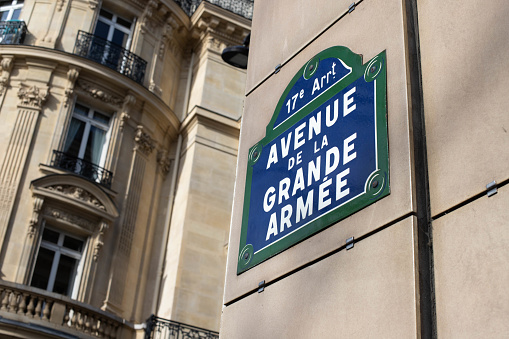 street sign indicating avenue de la grande armee, famous place in paris