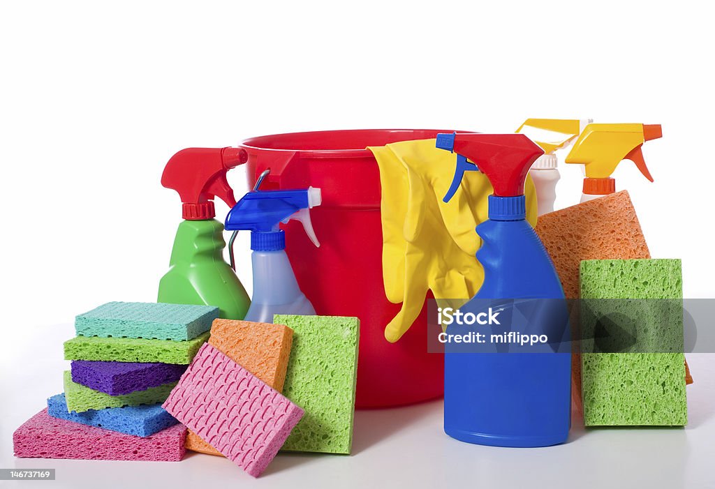 A colorful assortment of spring cleaning supplies  a variety of cleaning supplies and chemicals on a white background, including spray bottles, gloves, sponges, rags, and a bucket Bath Sponge Stock Photo