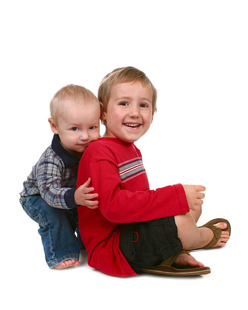 These two brothers, both diagnosed with autism and ADHD, enjoy a mild winter's day outdoors searching for their holiday Christmas tree.
