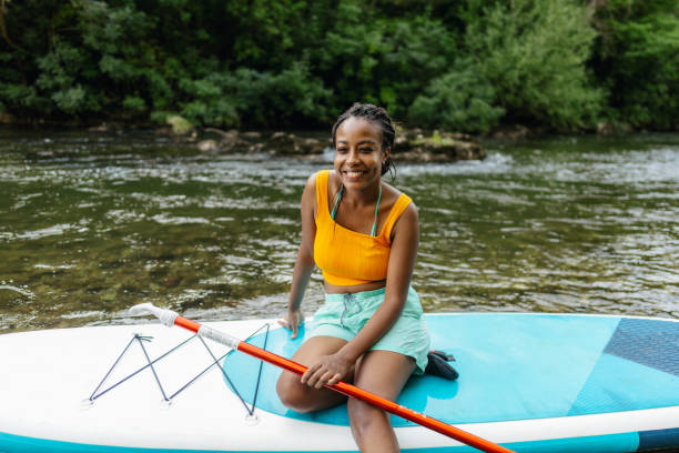 istock Woman and her standup paddleboard 1467375537