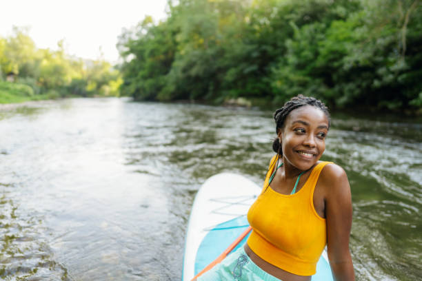 istock Woman and her standup paddleboard 1467375610