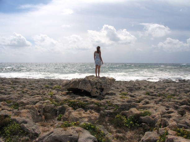 istock Woman looking at the sea 1467376164