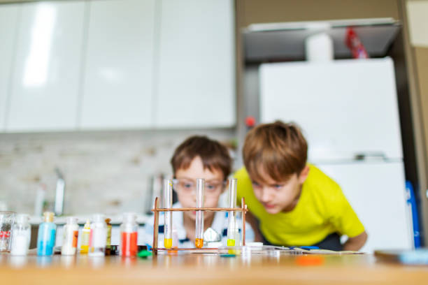 istock Two boys making science chemical experiment at home 1467376727