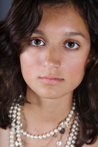Simple portrait of beautiful young woman's face.