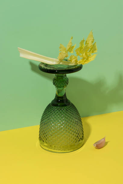 istock Minimalistic still life with celery and garlic. 1467379578