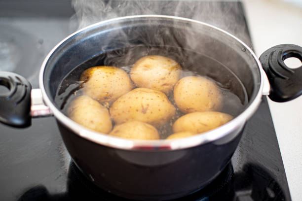 istock Potatoes in a pot with boiling water 1467386842