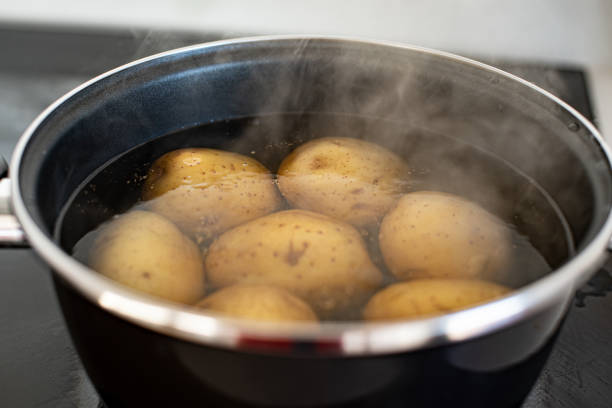 istock Potatoes in a pot with boiling water 1467386915