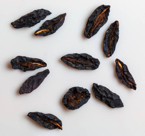 istock Dried plum or prunes on a white background. Top view. Flat lay 1467388126