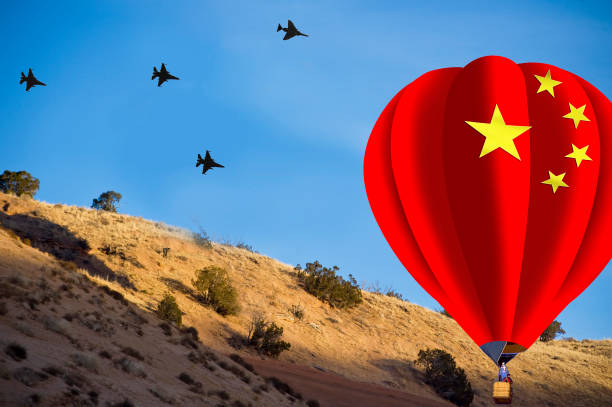 china spy balloon with military jets. - chinese spy balloon stok fotoğraflar ve resimler