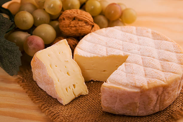 French cheese French red cheese munster stock pictures, royalty-free photos & images